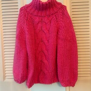 Beautiful big knit hot pink sweater with large turtleneck. Size medium.